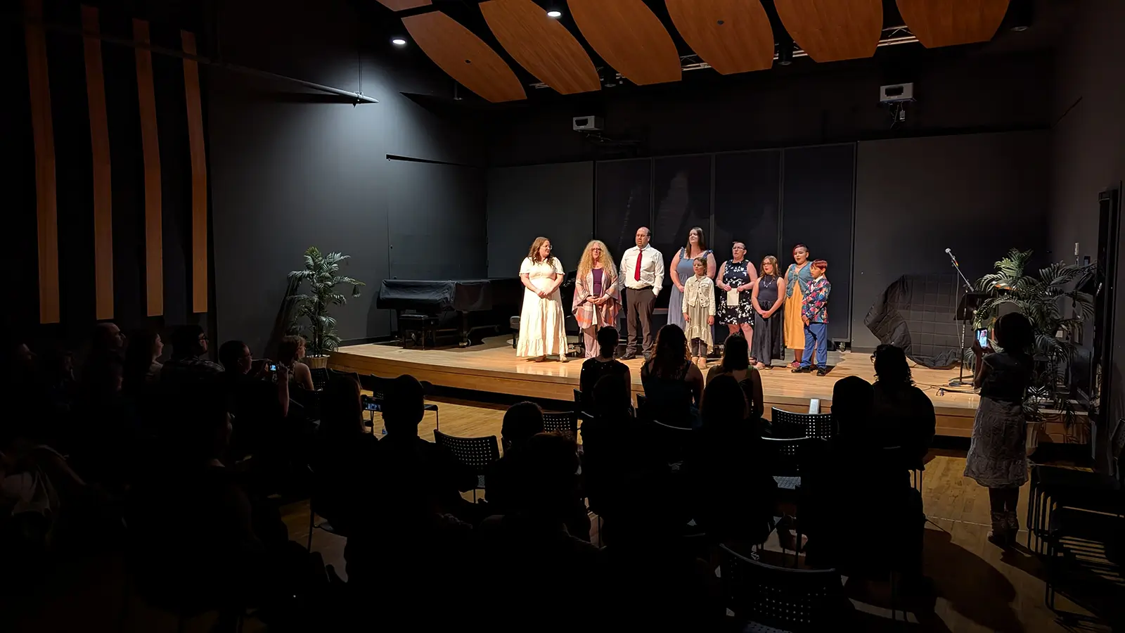 Several TVS students performing a group song at the 2025 Year End Recital.